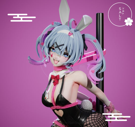 May include: A 3D-printed figurine of a character with blue hair, bunny ears, and a black and pink outfit. The figurine has a playful expression and is posed with a pole. The text "Miku Rabbit hole - DECO*27" is visible at the bottom.